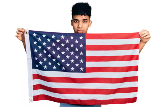 Young african american man holding united states flag depressed and worry for distress, crying angry and afraid. sad expression.