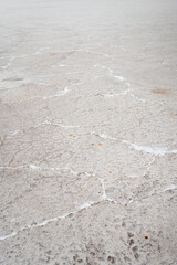 View of the ground of Salar de Uyuni salt flats in Bolivia