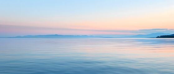 Fototapeta na wymiar Seascape with pastel twilight colors and serene water reflections.