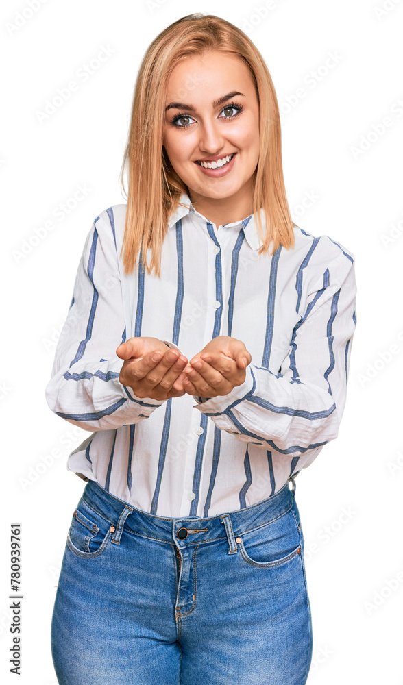 Wall mural Beautiful caucasian woman wearing casual clothes smiling with hands palms together receiving or giving gesture. hold and protection