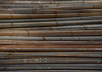 set of reinforced steel. metal, iron rusty background. Steel armature. Gray new metal fittings. The bars of reinforcement.
