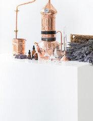 Distillation of lavender essential oil. Copper alambic in a Scandinavian interior. Chemical laboratory - 780941564