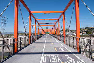 View of the bike path bridge crossing the Los Angeles River between Elysian Valley and Cypress Park in Los Angeles, California.