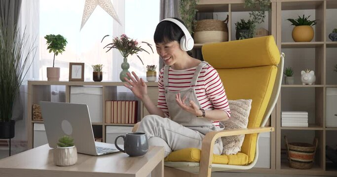 mature woman businesswoman have video call use laptop at home