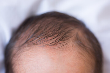 Tiny little newborn human baby
