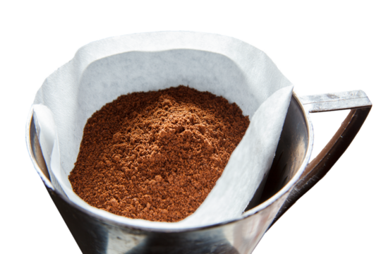 Roasted and ground coffee in paper filter