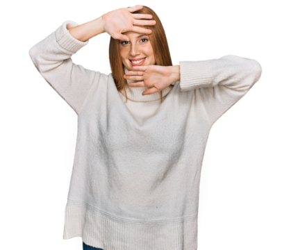 Young irish woman wearing casual winter sweater smiling cheerful playing peek a boo with hands showing face. surprised and exited