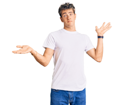 Young handsome man wearing casual white tshirt clueless and confused expression with arms and hands raised. doubt concept. - Powered by Adobe