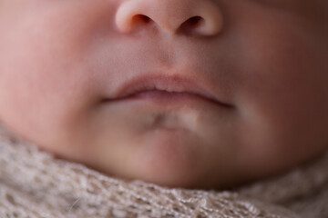 Little tiny newborn human baby tenderness
