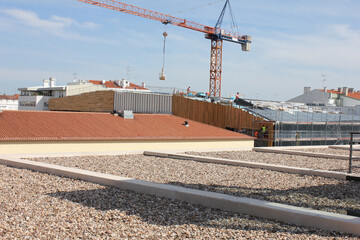 
construction site with crane in castelo branco - portugal
