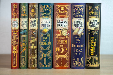 Naklejka premium J.K. Rowling's Harry Potter books in various editions, evoking sense wonder and excitement for readers all ages, and celebrating power imagination and storytelling, Frankfurt - December 22, 2023