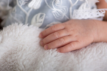 Little newborn baby hands 