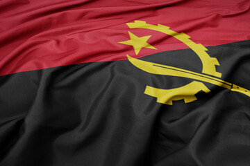 waving colorful national flag of angola.