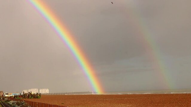Rainbow Double Grey Sky Rain Cloudy Overcast Beach Seaside Refraction Color