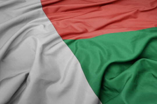 waving colorful national flag of madagascar.
