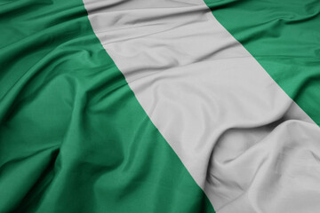 Obraz premium waving colorful national flag of nigeria.