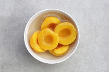 Peach halves in syrup. Fruity desserts