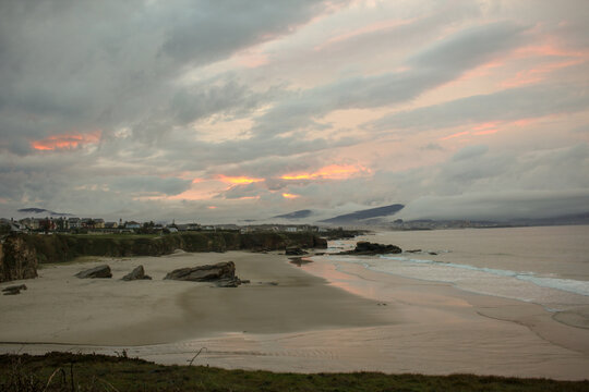 sunset in a beach in Barreiros, Spain