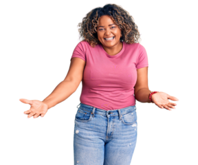 Young african american plus size woman wearing casual clothes smiling cheerful with open arms as friendly welcome, positive and confident greetings