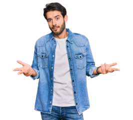 Young hispanic man wearing casual clothes clueless and confused with open arms, no idea concept.