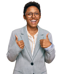 Young african american woman wearing business clothes success sign doing positive gesture with...