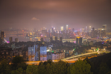 Fototapeta na wymiar Panorama night view of Chongqing Nan An district. Background image