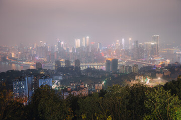 Fototapeta premium Night city architecture landscape and colorful lights in Chongqing