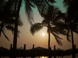 BANGSAEN,THAILAND 2024 , Bangsaen beach Sunset Tourists come to relax. The beach at Bangsaen, Chonburi Province Thailand