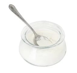  Baking powder in glass jar and spoon isolated on white © New Africa