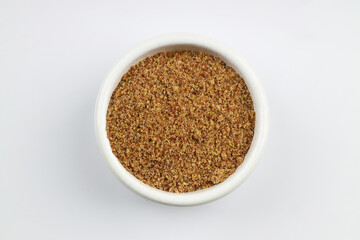 Pile of flax seeds isolated on white background