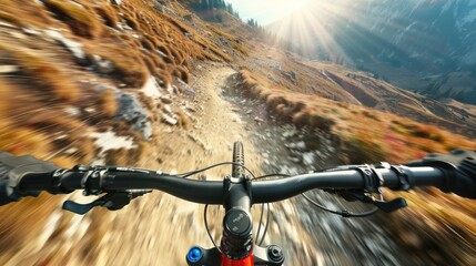A close up of a mountain bike rider on a dirt road. - obrazy, fototapety, plakaty