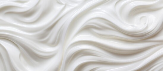A swirl of creamy white substance beautifully contrasting with the table surface