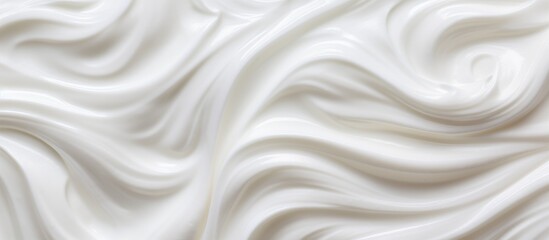 Fototapeta premium A swirl of creamy white substance beautifully contrasting with the table surface