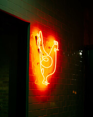 Red Neon Chicken Sign at Night