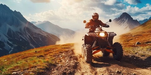 A man is driving an ATV on a dirt road in the mountains. The scene is peaceful and serene, with the man enjoying the ride and the beautiful surroundings - obrazy, fototapety, plakaty