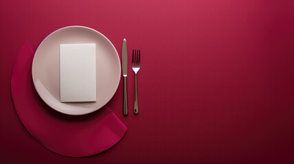 Elegant table setting with white square plate, cutlery, and pink napkin on maroon background - obrazy, fototapety, plakaty