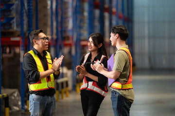 A group of warehouse employees, Inspecting products on warehouse shelves before they are sent to retailer