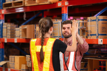 A group of warehouse employees, Inspecting products on warehouse shelves before they are sent to retailer - obrazy, fototapety, plakaty