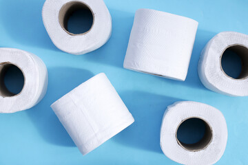 Toilet paper on blue background.
