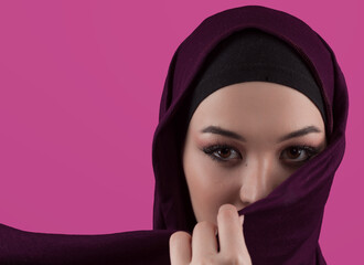 Modern Muslim woman wearing stylish hijab casual wear isolated on pink background. Diverse people model hijab fashion concept. - 781031304