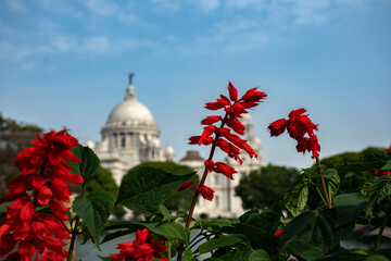 Out off focus the beautiful Victoria Memorial the iconic tourist destination in Kolkata.