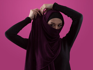 Modern Muslim woman wearing stylish hijab casual wear isolated on pink background. Diverse people model hijab fashion concept. - 781033139