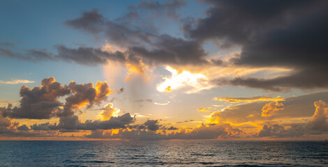 Sea beach with sky sunset or sunrise. Cloudscape over the sunset sea. Sunset at tropical beach....