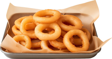 Onion rings piled on a rectangular metal tray with brown craft paper isolated.