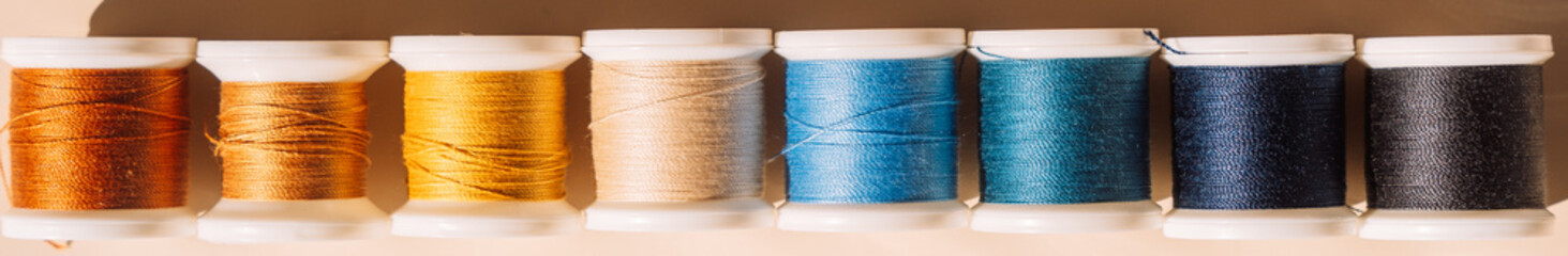Close-up of colorful skeins of sewing thread.