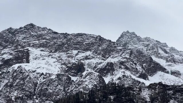 Snow filled mountains with blue skies landscape near Manali Kashmir Rothang pass India