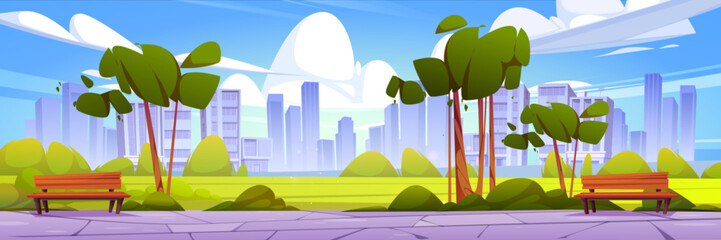 Naklejka premium Summer park against cityscape background. Vector cartoon illustration of wooden benches along road, tall trees, green bushes and lawn, silhouettes of modern skyscrapers on horizon, blue sunny sky