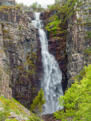 Waterfall in a wild mountain landscape