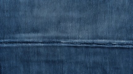 A blue denim fabric with a white line running through it
