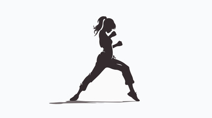 Fototapeta na wymiar Silhouette of a woman doing a martial art kick. 